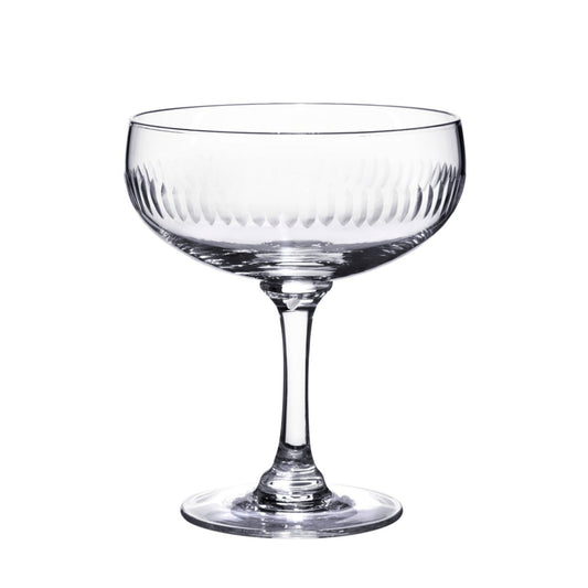 Elegant crystal cocktail glasses with spear-shaped stems, featuring a sophisticated design by The Vintage List.