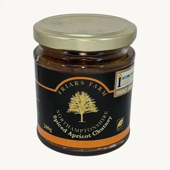 Spiced apricot chutney jar from Friars Farm, 200g, with visible apricot chunks and a rich, spicy glaze.