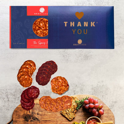 Bray Cured Spicy Feasting Five charcuterie selection featuring spicy cured meats on a wooden board.