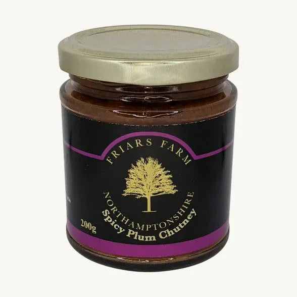 Jar of Friars Farm Spicy Plum Chutney showing the colorful chutney inside a glass jar with a label.