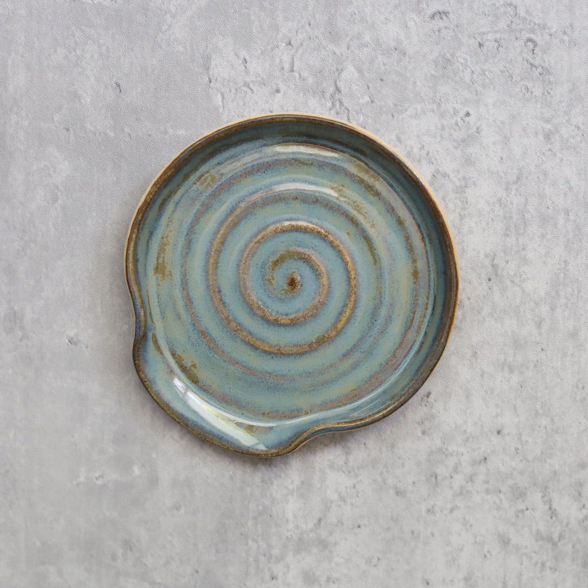 Seafoam blue classic spoon rest by Katie L Thompson Designs, flat lay showing smooth ceramic surface and functional kitchen design.