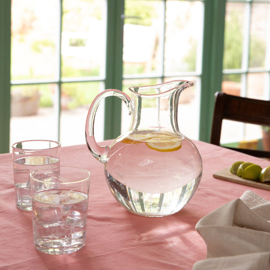 Large crystal water jug with a stars design by The Vintage List, featuring a clear glass body and star-shaped decorative accents.