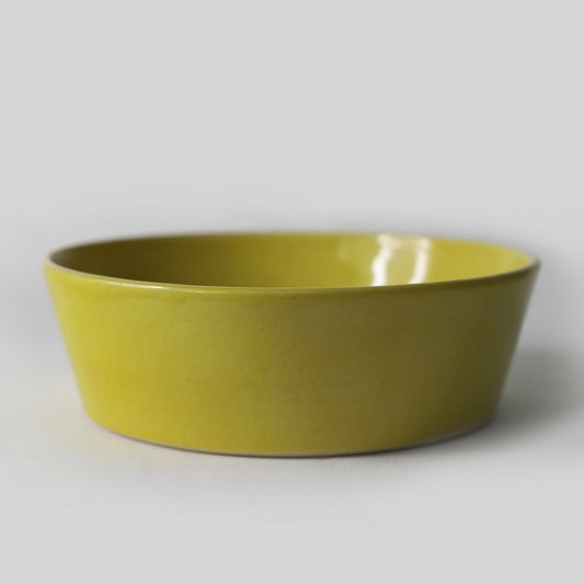 Sun yellow classic pasta bowl by Katie L Thompson Designs, featuring a vibrant, round ceramic bowl ideal for serving pasta.
