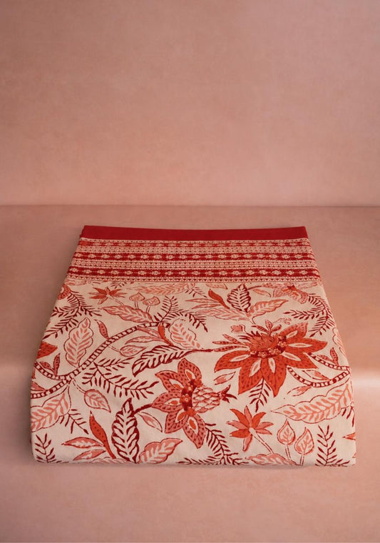 Red Bossa Nova tablecloth by Casa by Josephine Jenno, featuring vibrant fabric with a stylish pattern.