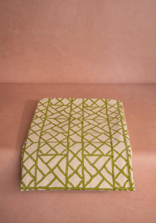 Green bamboo grove pattern tablecloth by Casa by Josephine Jenno, featuring natural bamboo design on fabric.