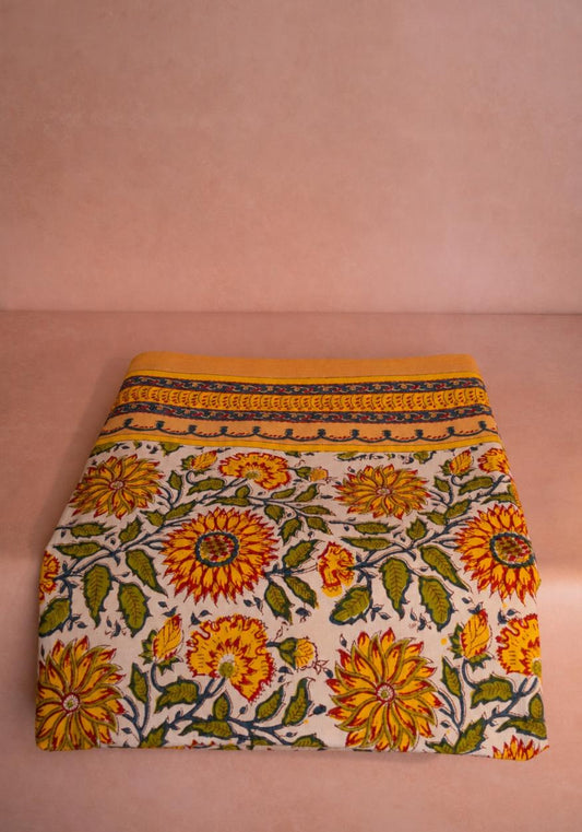 Casa by Josephine Jenno My Favourite Marigold tablecloth with vibrant marigold floral pattern on fabric.
