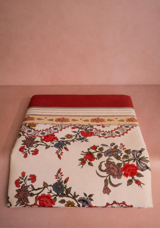 Red cotton tablecloth with Somerset Scroll design by Casa, featuring intricate scroll patterns for elegant dining.