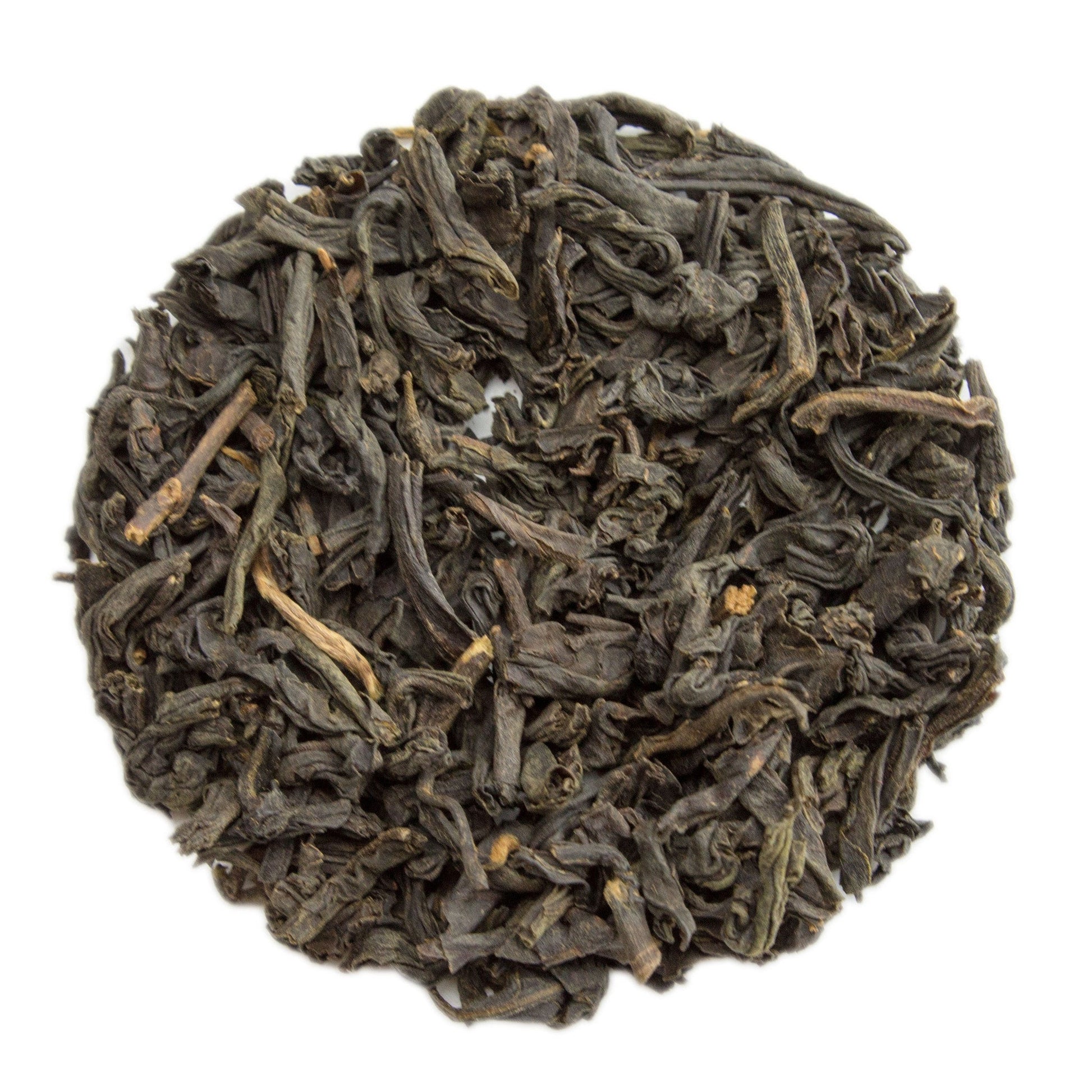 A steaming cup of Lapsang Souchong tea from PekoeTea Edinburgh, showing dark brewed tea in a white cup with a saucer.
