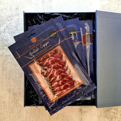 Assorted Bray Cured charcuterie selection with five packs arranged in a box, showcasing savory cured meats and artisanal packaging.