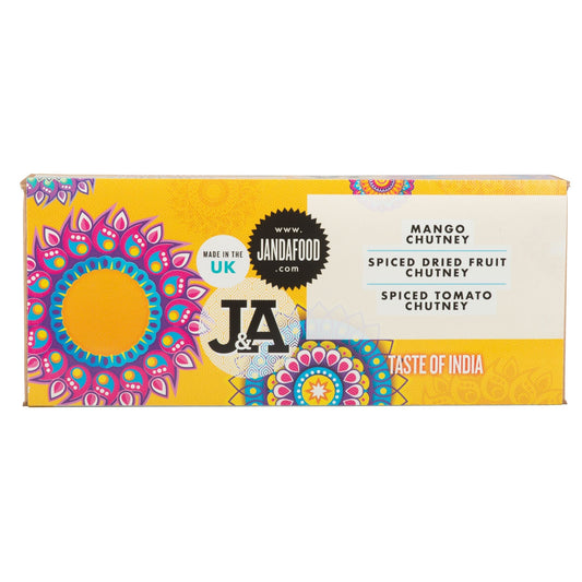 Janda Taste of India gift box with assorted Indian snacks and spices arranged in a decorative gift package.