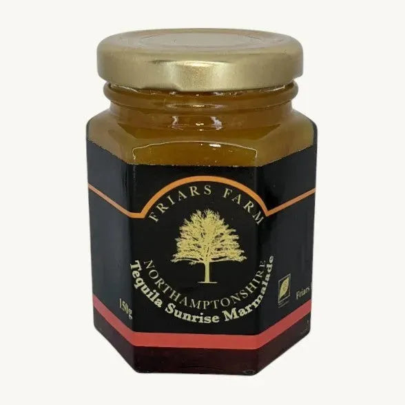 Jar of Tequila Sunrise Marmalade by Friars Farm showing vibrant orange and red citrus marmalade in a glass jar.