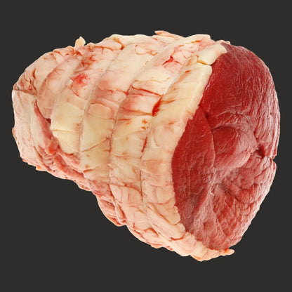 Primrose Herd grass-fed beef topside joint, fresh raw beef cut showing lean muscle and marbling on a clean surface.
