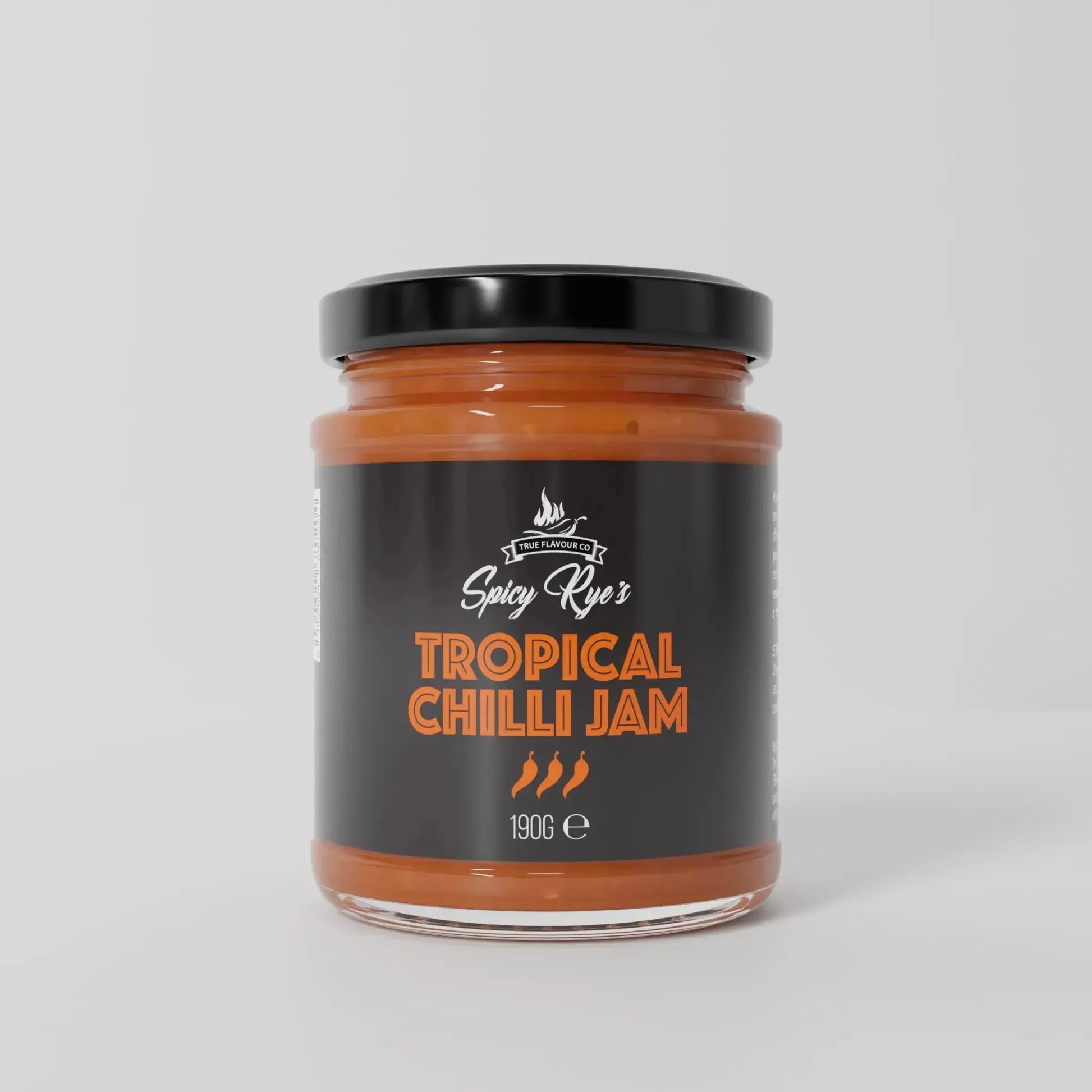 Spicy Ryes Tropical Chilli Jam jar with vibrant fruit and chili ingredients, showcasing the flavorful tropical chutney.