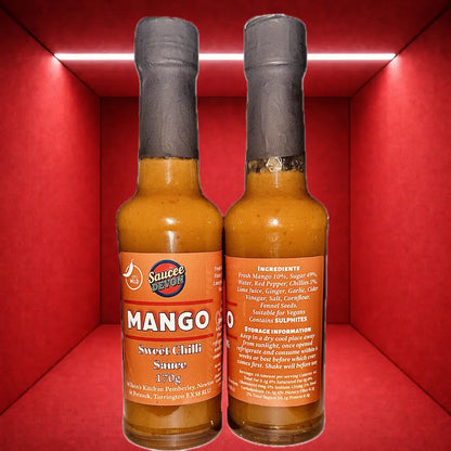 Wilson’s Kitchen Mango Sweet Chilli Sauce in a glass bottle, showcasing vibrant orange mango and red chili pepper ingredients.