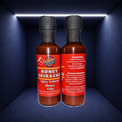 Wilson’s Kitchen Honey Sriracha Sauce bottle with label showing chili peppers and honey, ready for cooking or dipping.