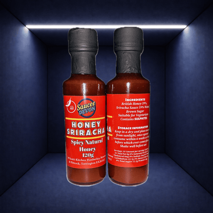 ArtisanBox Honey Sriracha Sauce in a glass bottle with a red cap, showcasing the spicy and sweet chili sauce.