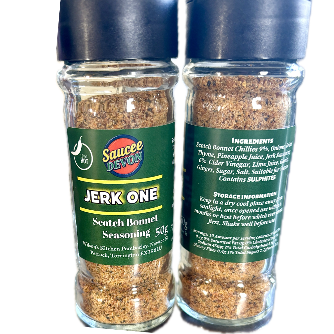 Wilson’s Kitchen Jerk Scotch Bonnet Seasoning in a jar, featuring vibrant chili peppers and spices for Caribbean cuisine.