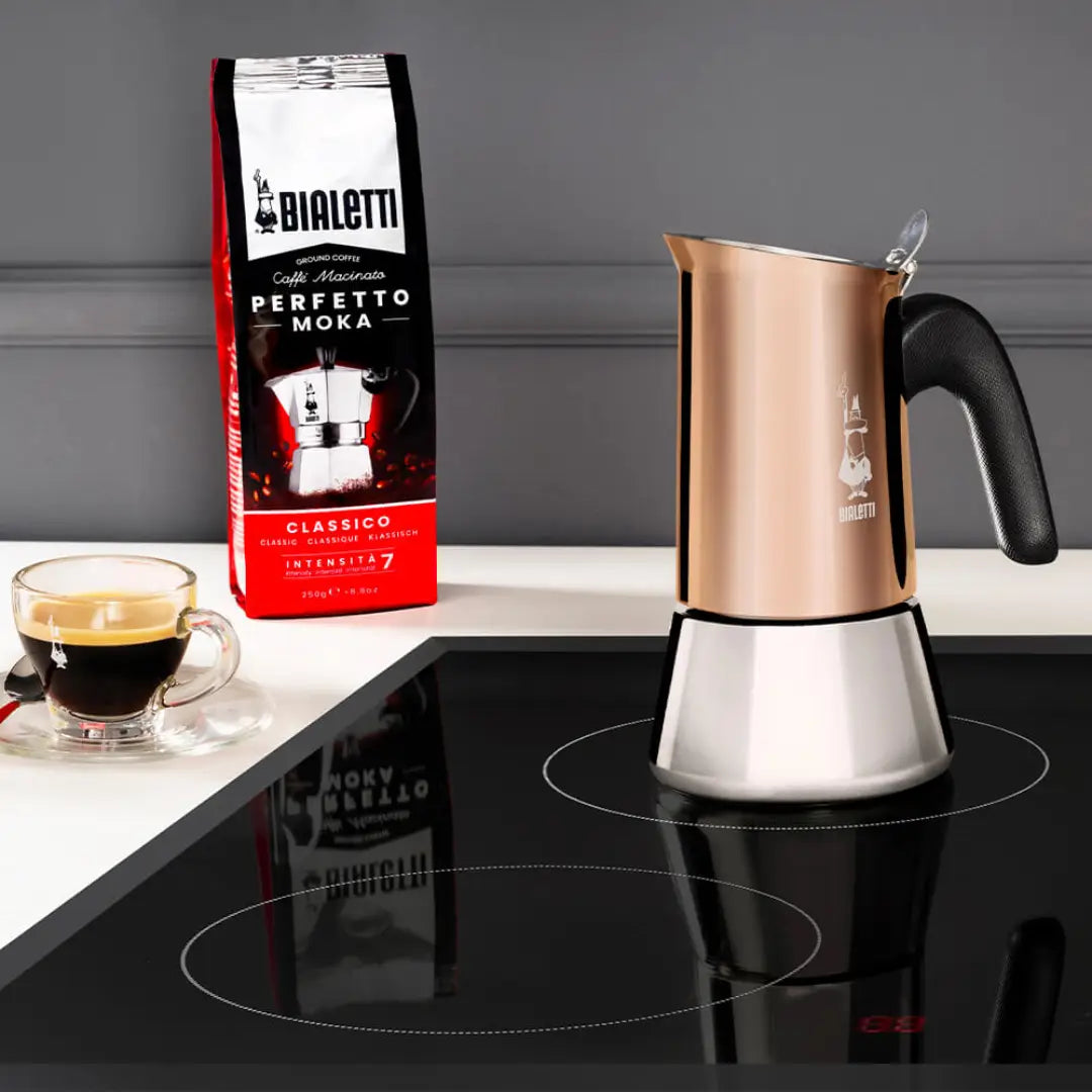 Bialetti Venus copper stovetop coffee maker by Brew Italia, showcasing its sleek design and induction-compatible hardware.