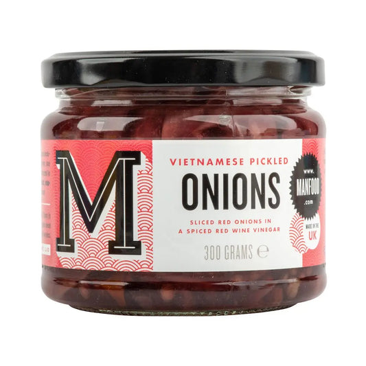 Vietnamese pickled onions by Manfood in a jar, showcasing vibrant, sliced pickles ready for use.