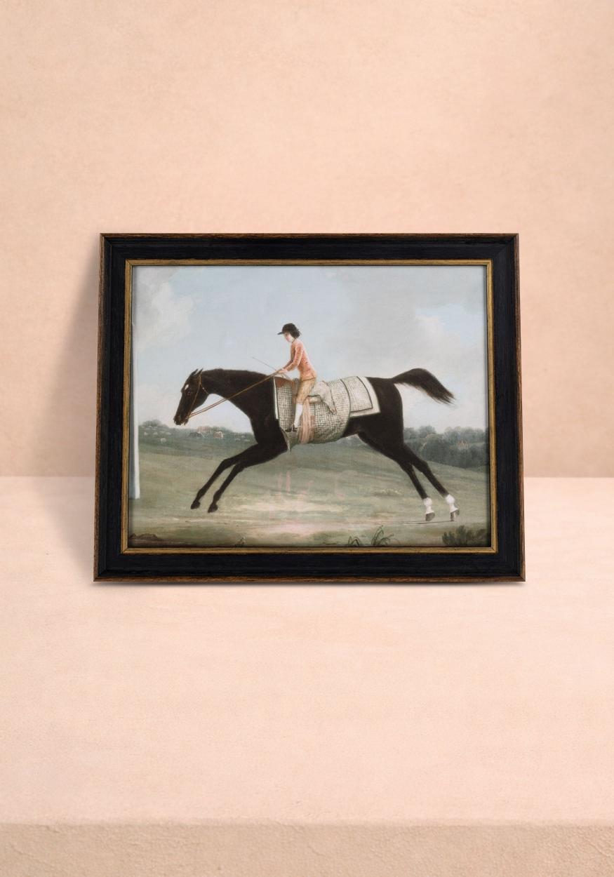 Vintage racing horse wall art prints by Casa, featuring dynamic horse images on a wall display.
