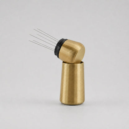 KNOCDIC® metallic gold espresso WDT tool with standing holder for precise coffee grind distribution.