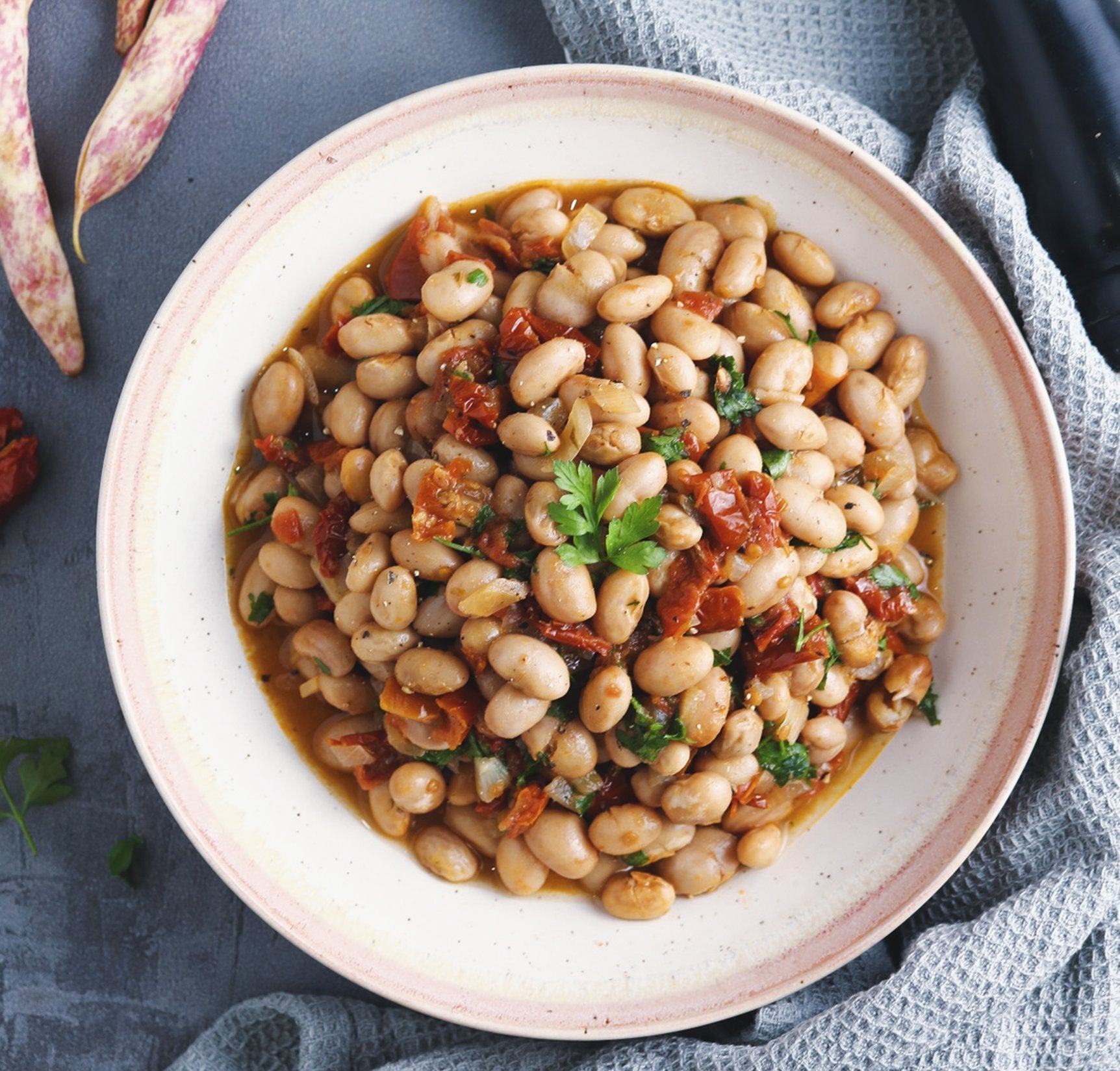 Whole Food Earth Borlotti Beans, GMO-free, natural, vegan pulses in a bowl, showcasing their plump, beige and red mottled appearance.
