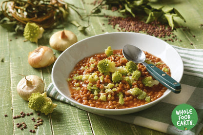 Whole Food Earth brown lentils, GMO-free, natural vegan beans and pulses, shown in a close-up image.
