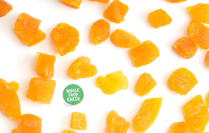 Dried chopped apricots from Whole Food Earth, GMO-free and vegan dried fruit with no added sugar, shown in serving size.