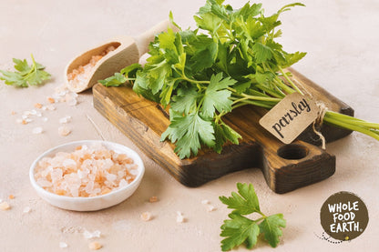 Whole Food Earth coarse Himalayan salt crystals, unrefined and additive-free, showcasing natural pink mineral-rich salt.