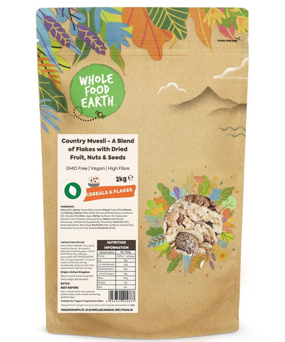Whole Food Earth Country Muesli cereal with flakes, dried fruit, nuts, and seeds in a bowl, GMO-free and vegan-friendly.