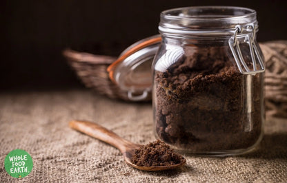 Dark Muscovado Sugar from Whole Food Earth, GMO-free, vegan, and dairy-free, shown in a natural, granulated form.