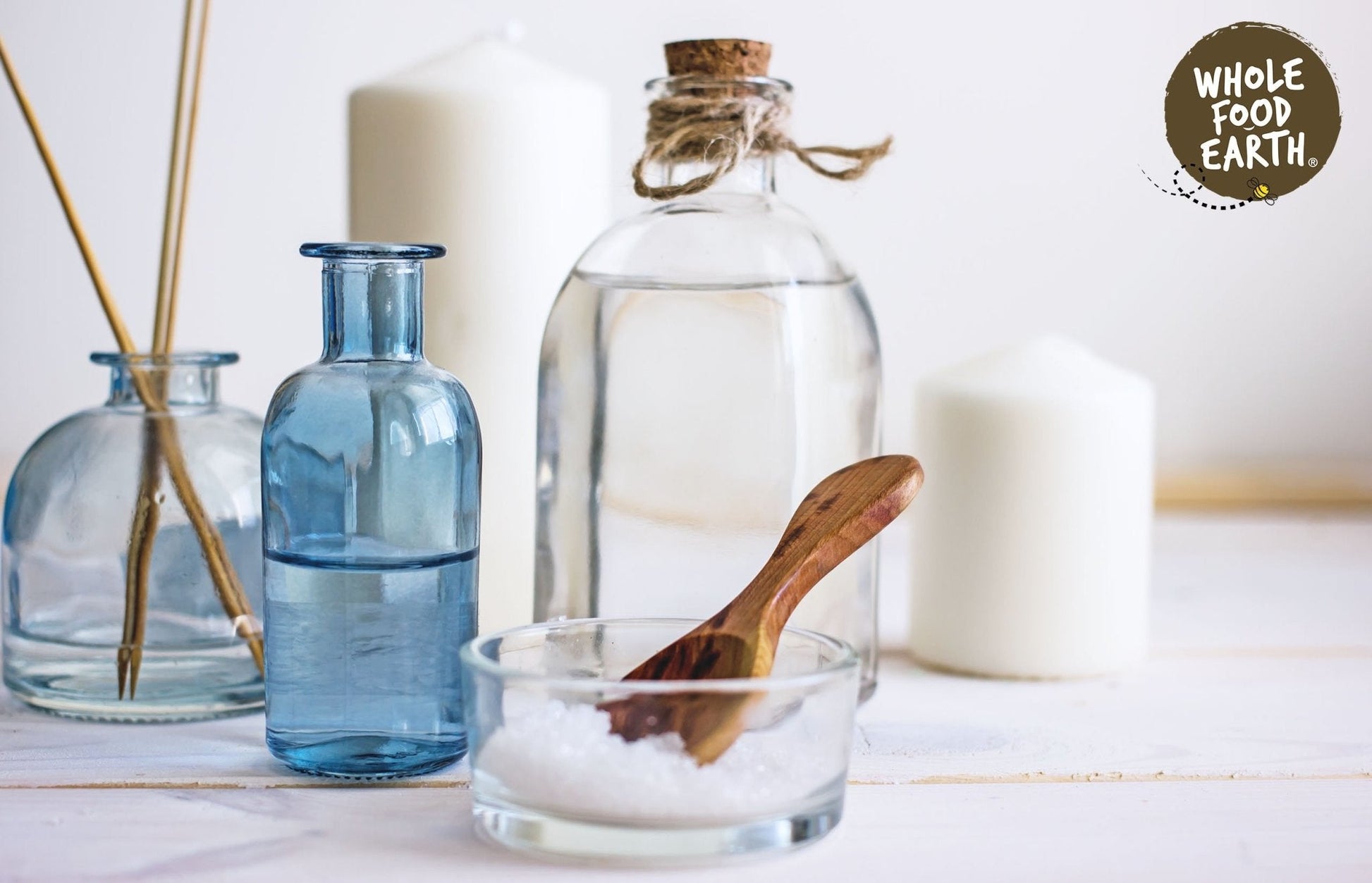 Whole Food Earth Epsom Bath Salts, additive-free mineral salts for relaxing bath experience, shown in a clear container.