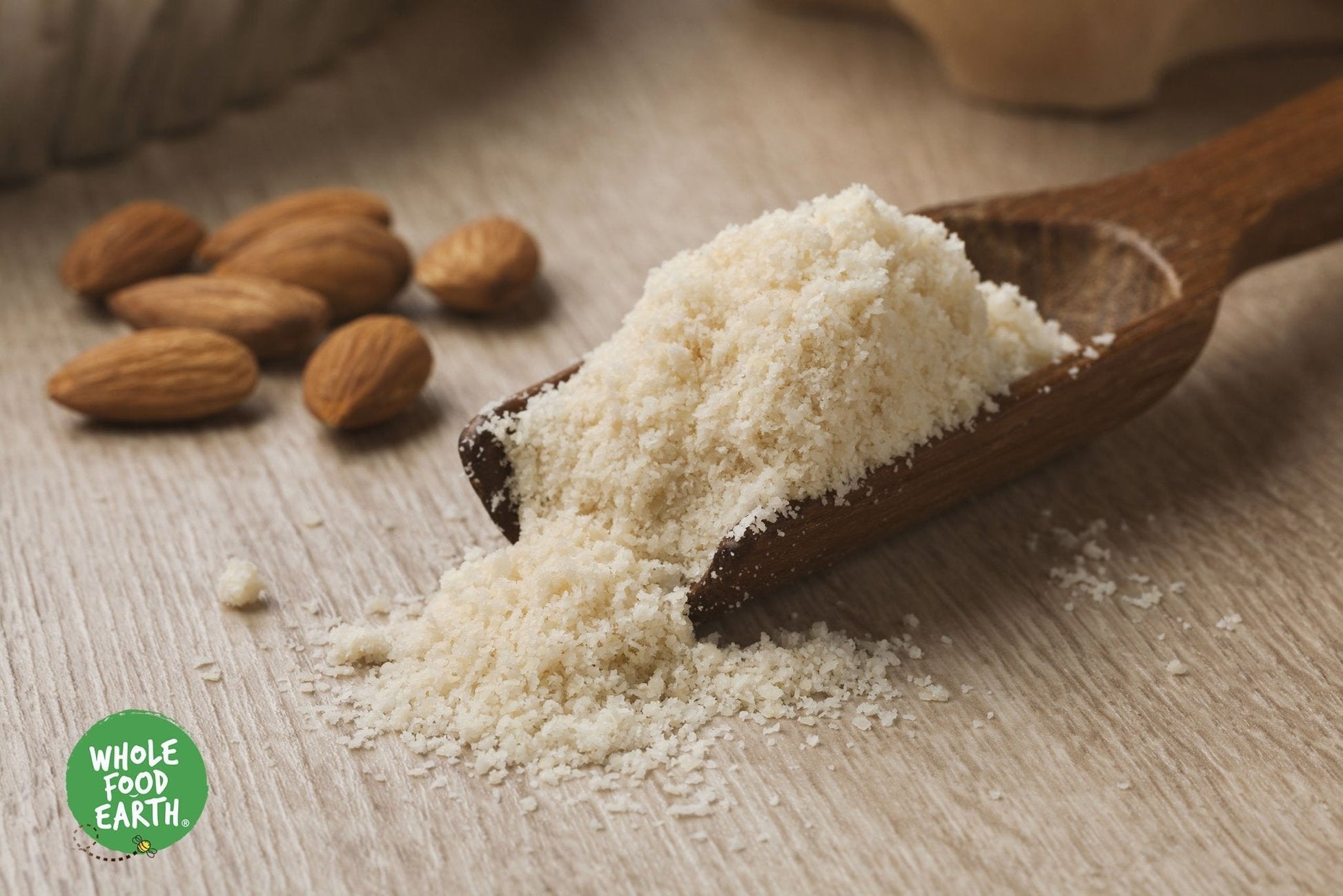 Ground almond flour from Whole Food Earth, featuring fine, natural almond pieces in a resealable bag, GMO-free and vegan-friendly.