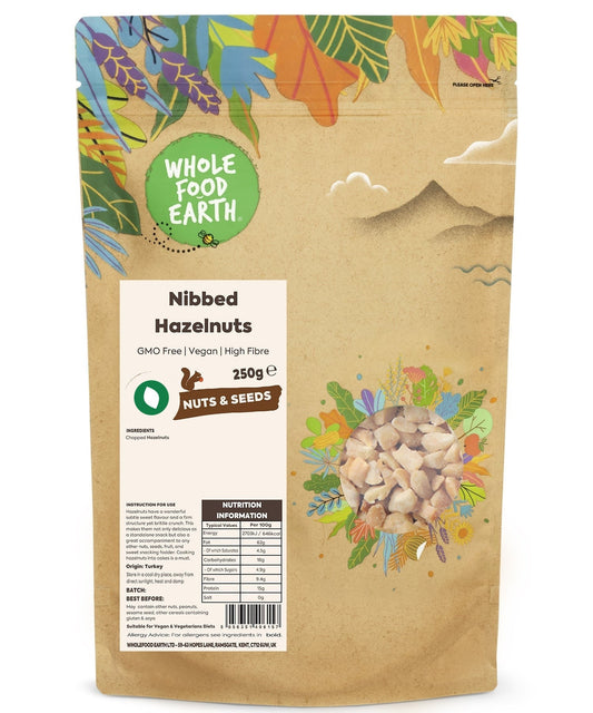 Nibbed hazelnuts from Whole Food Earth, GMO-free and vegan, shown in a close-up image highlighting their textured surface.