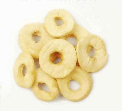Organic dried apple rings from Whole Food Earth, showing a close-up of golden apple slices with a natural, textured surface.