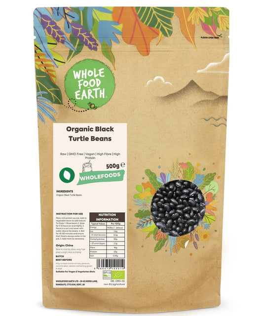 Whole dried organic black turtle beans from ArtisanBox, raw and natural, shown in a close-up image.