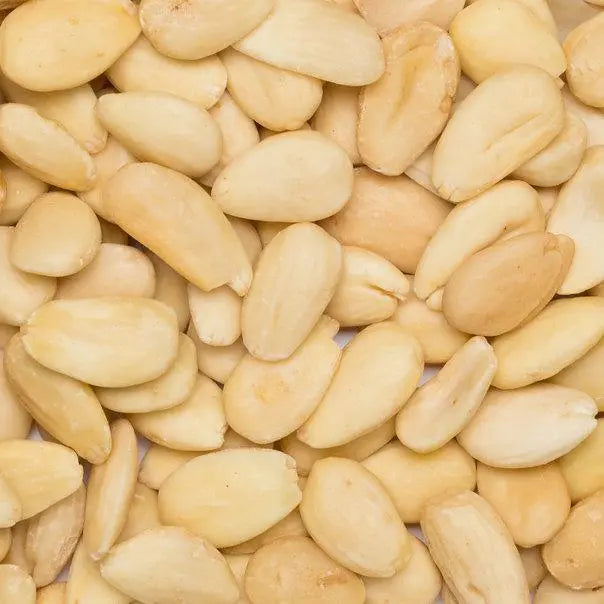 Raw organic blanched almonds from Whole Food Earth, showing light-colored, peeled nuts in a close-up image.