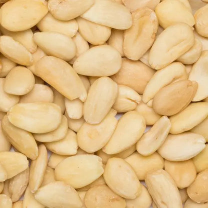 Raw organic blanched almonds from Whole Food Earth, showing light-colored, peeled nuts in a close-up image.