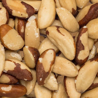 Raw organic Brazil nuts from Whole Food Earth, GMO-free, whole and unroasted, in a natural nut display.