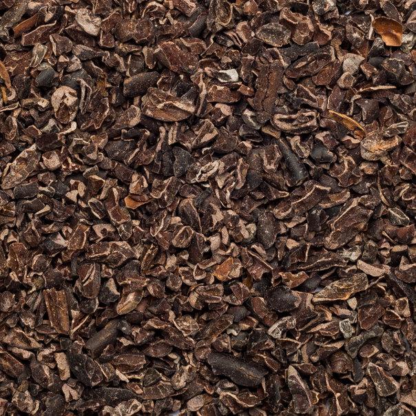 Organic cacao nibs from Whole Food Earth, raw vegan and GMO-free, shown in a close-up image highlighting their natural texture.
