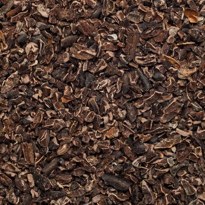Organic cacao nibs from Whole Food Earth, raw vegan and GMO-free, shown in a close-up image highlighting their natural texture.