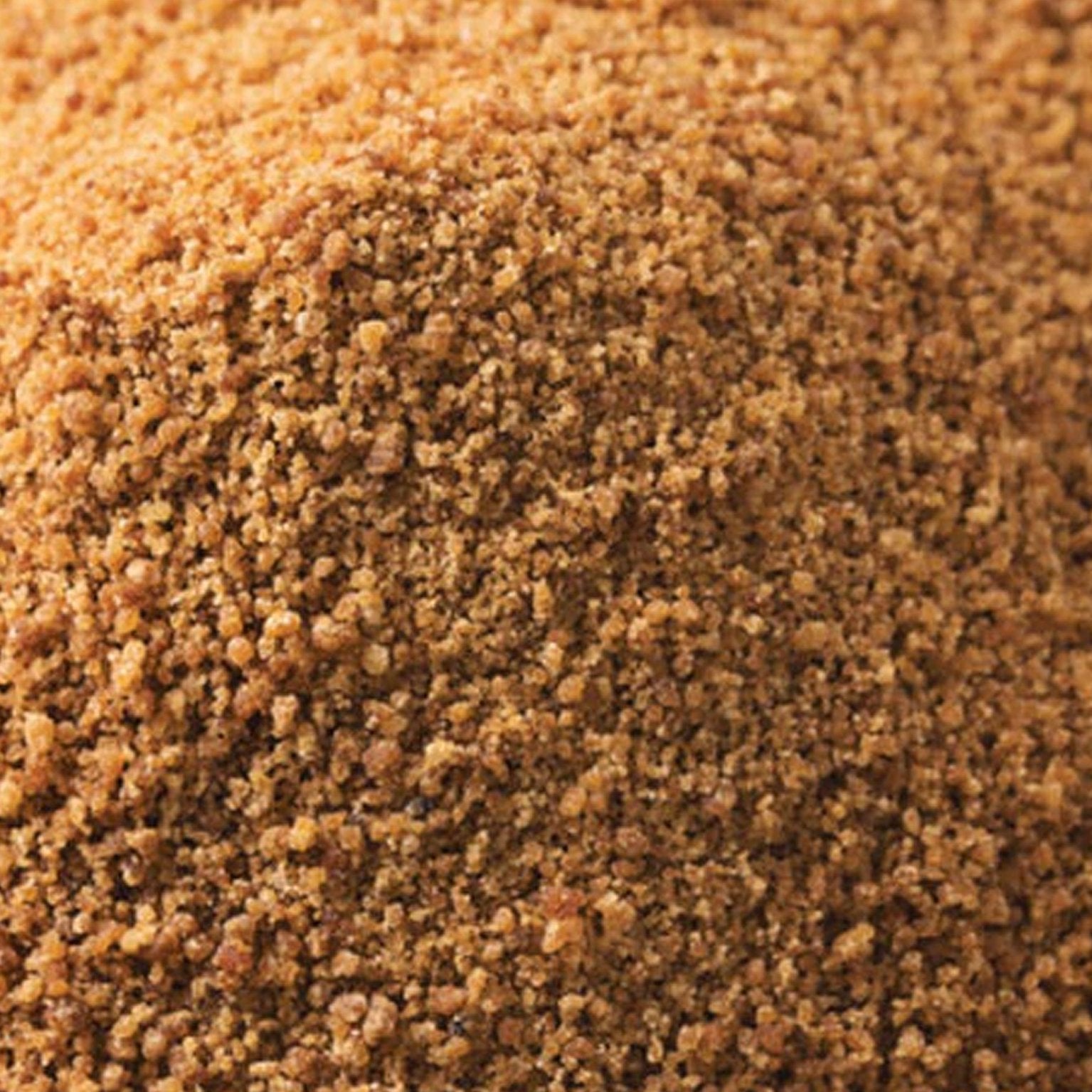 Organic coconut sugar from Whole Food Earth, natural sweetener with a bag of granulated coconut sugar on a wooden surface.