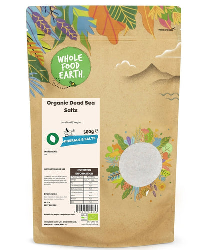 Organic Dead Sea salts from Whole Food Earth, unrefined mineral salts for skincare and relaxation, shown in a natural setting.