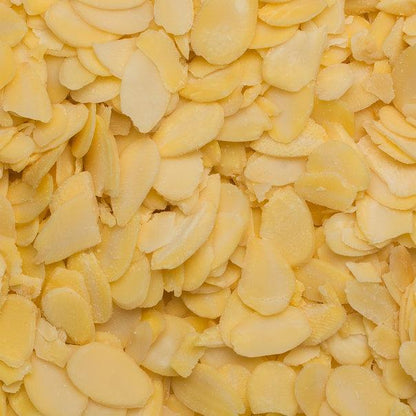 Organic flaked almonds from Whole Food Earth, GMO-free nuts and seeds, showing thin, light-colored almond flakes on a neutral background.