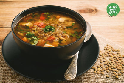 Organic green lentils from Whole Food Earth, close-up of dried green beans in a bowl, non-GMO pulses for healthy cooking.