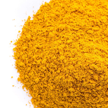 Organic turmeric powder from Whole Food Earth, vibrant yellow spice in a jar, rich in curcumin, vegan and GMO-free herbal spice.