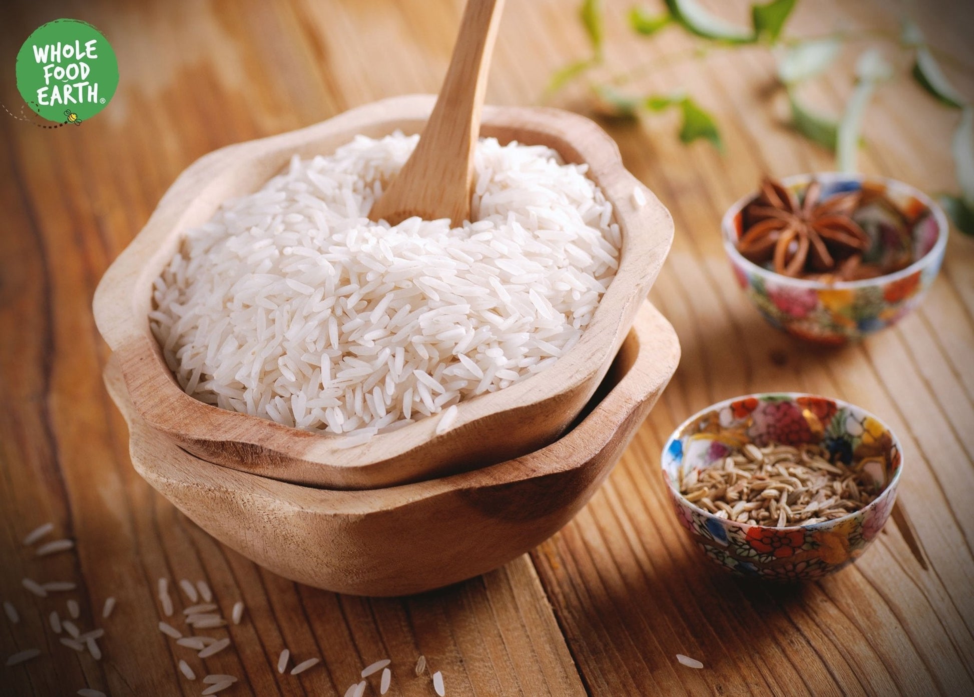 Organic White Basmati Rice from Whole Food Earth, showing long, slender grains in a clear bag, GMO-free, ideal for flavorful dishes.