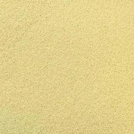 Raw organic white couscous from Whole Food Earth, GMO-free, vegan, and additive-free in a close-up image.
