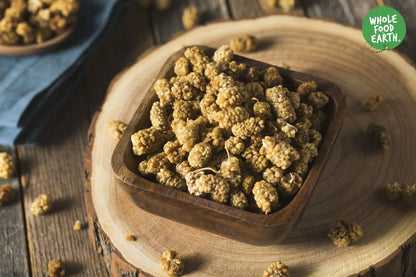 Dried organic white mulberries from Whole Food Earth, GMO-free and raw, shown in a close-up of the sundried berries.