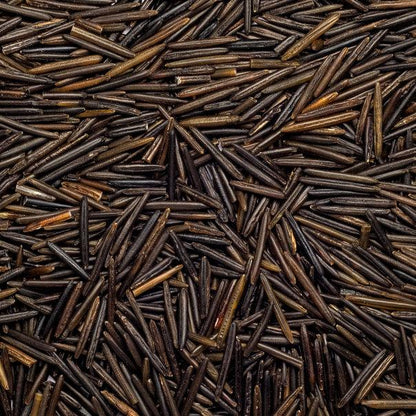 Raw organic wild rice from Whole Food Earth, Canadian GMO-free rice with natural, unprocessed grains in a clear bag.